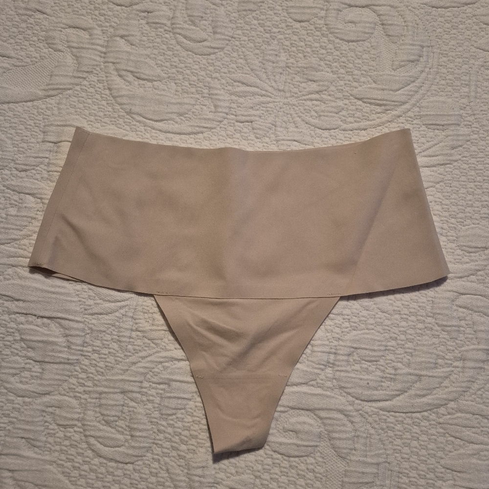 Spanx women's size small tan high waisted thong panty, side seam damage